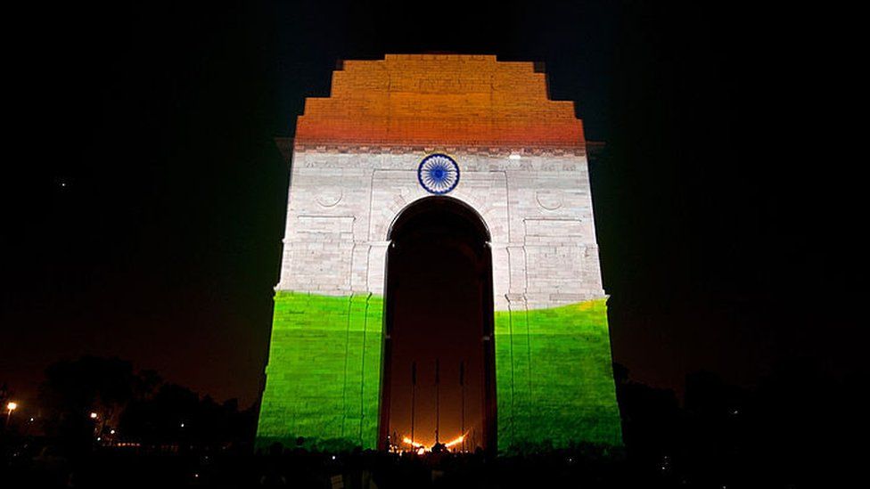 3D mapping projections display the Indian tricolor national flag on the India Gate
