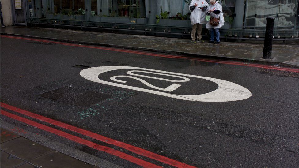 20mph sign painted on a London road
