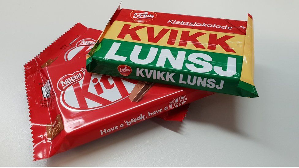 A Kvikk Lunsj chocolate bar is perched atop a Kit Kat in this photo