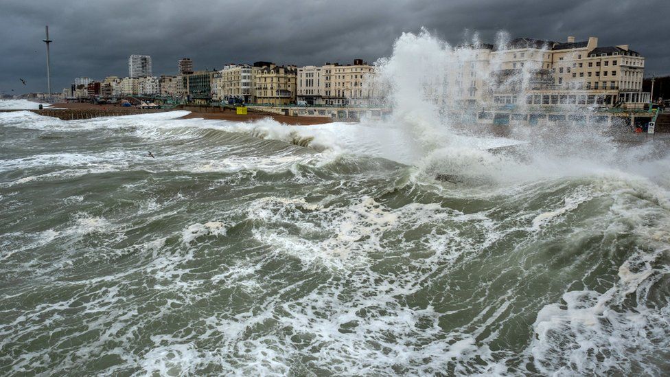 Waves crash on the shore at Brighton beach, England. Photo: November 2018