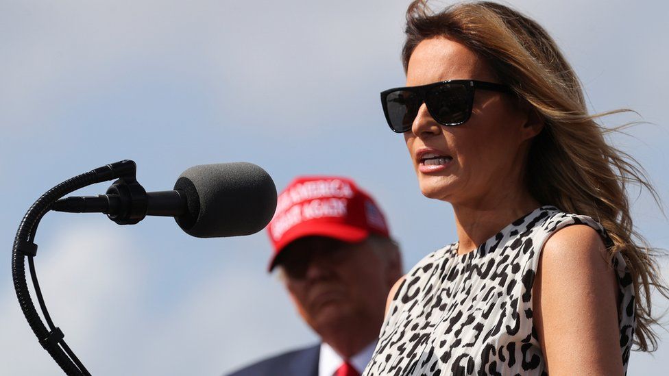 First Lady Melania Trump speaks next to U.S. President Donald Trump during his campaign rally outside Raymond James Stadium, in Tampa, Florida, U.S., October 29, 2020