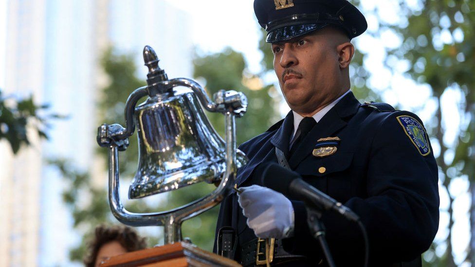 A bell is rung during a moment of silence during the annual 9/11 Commemoration Ceremony at the National 9/11 Memorial and Museum on September 11, 2021 in New York City.