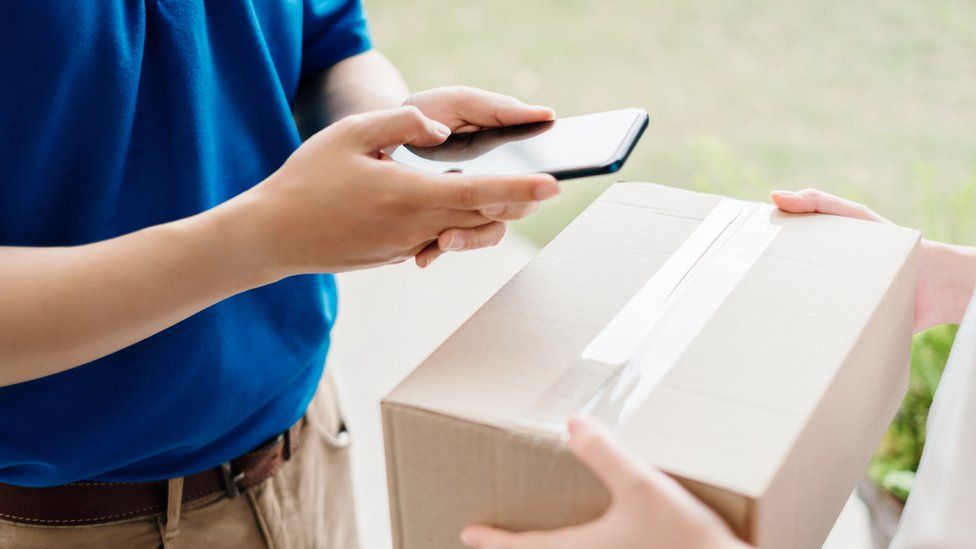 Stock image of a parcel being delivered