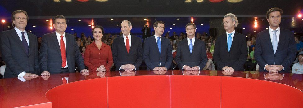 Dutch political party leaders (L-R) Alexander Pechtold from D66, Emile Roemer of the Socialist Party, Femke Halsema of the Green Party, Job Cohen from the Labour Party, Andre Rouvoet of the Christian Union, Jan Peter Balkenende of Christian Democrats, Geert Wilders of the Freedom Party and Mark Rutte of VVD stand prior to the debate on June 8, 2010 in The Hague. The leading candidates debate in the Dutch parliament in The Hague, the night before the elections.
