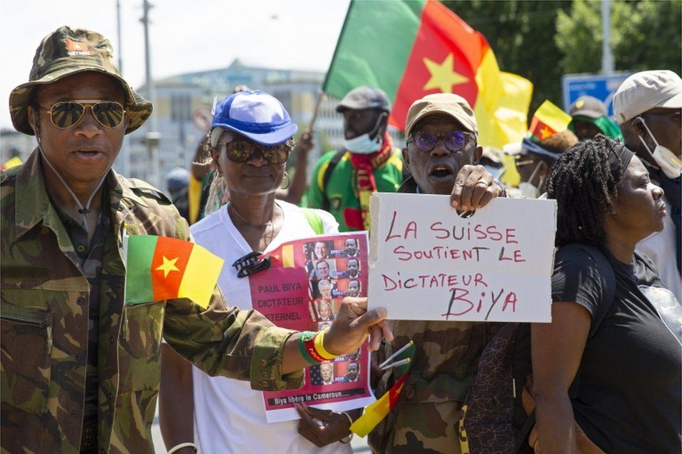 Opponents of Cameroon's President Paul Biya protest against his presence in Geneva, Switzerland.