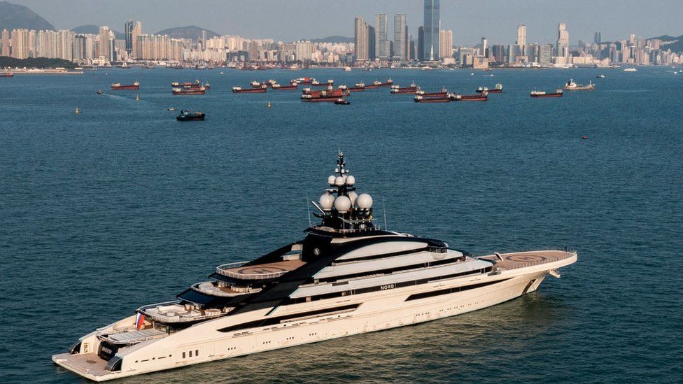 The Nord superyacht docked successful  Hong Kong waters with the metropolis  skyline successful  the background