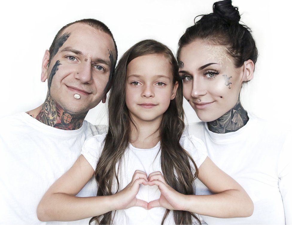 Monami Frost with her daughter and husband
