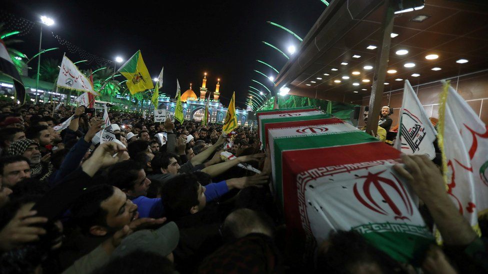 Mourners attend the funeral procession of Qassem Soleimani and Abu Mahdi al-Muhandis in Karbala, 4 January