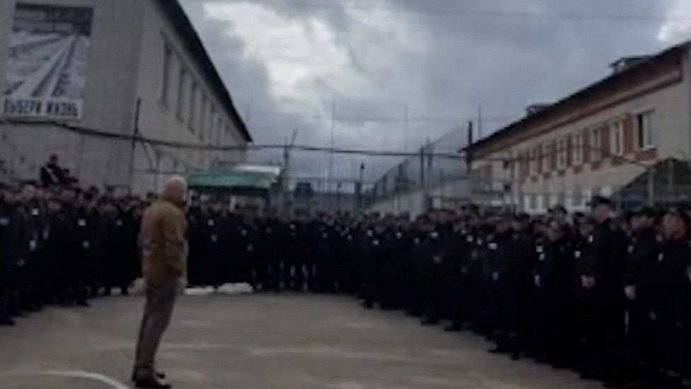 Yevgeniy Prigozhin addressing a large group of prisoners