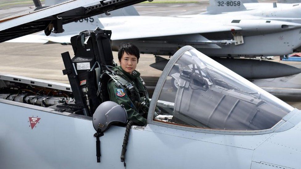 First Lieutenant Misa Matsushima of the Japan Air Self Defence Force poses in the cockpit of an F-15J air superiority fighter