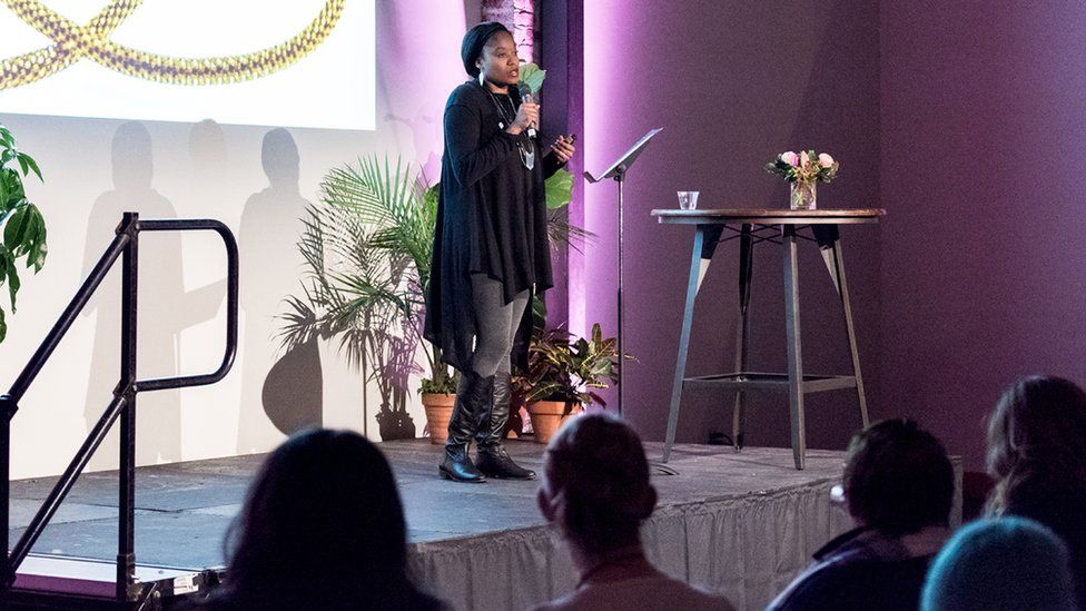 Aniyia Williams speaking at the recent DazzleCon in Portland, Oregon