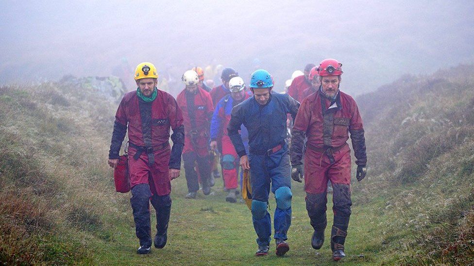 Rescuers assemble near the Ogof Ffynnon Ddu caves, 8 November 2021
