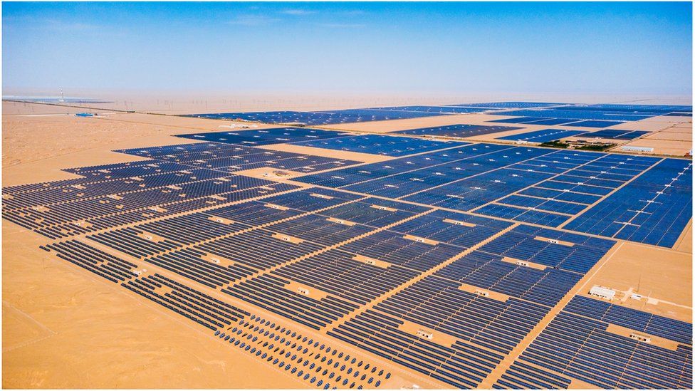Large photovoltaic panels are placed neatly. Dunhuang City, Gansu Province, China