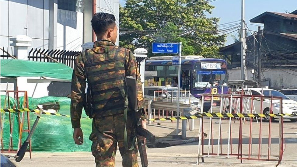 An armed military soldier crosses a road in Yangon, Myanmar, 08 January 2022.