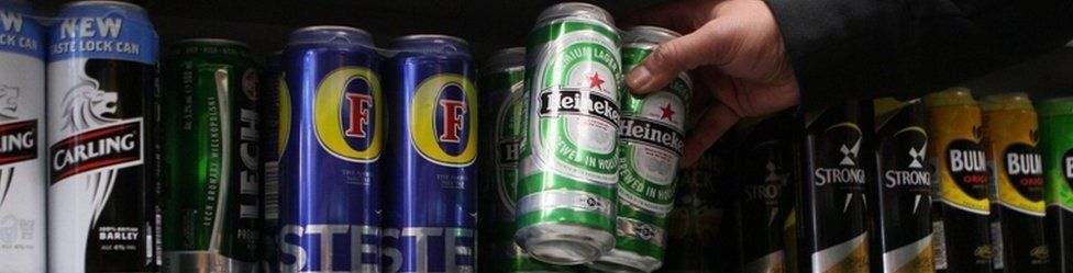 Cans of lager in off-licence