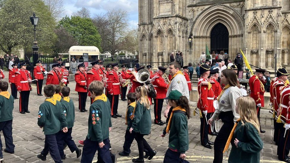 Scouts and The Yorkshire Volunteer Band outside York Minster