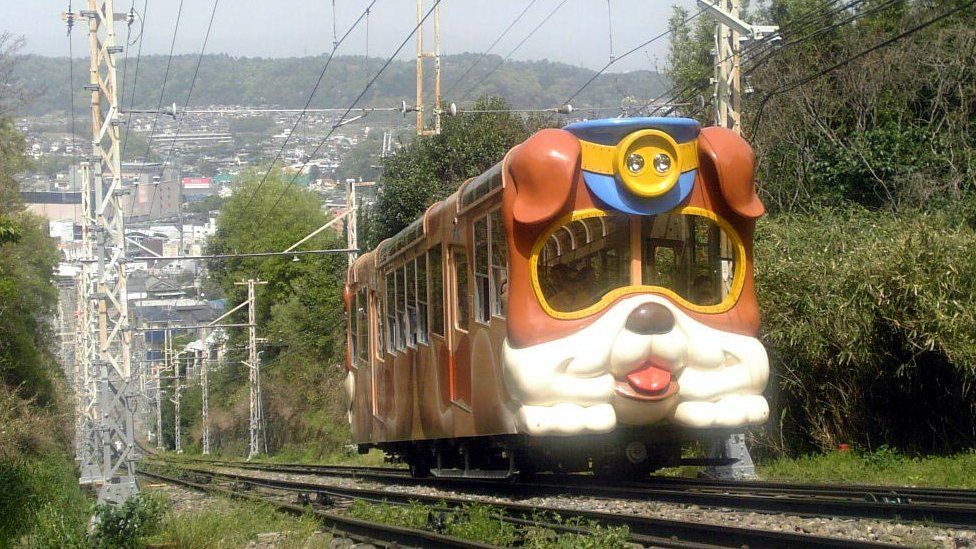 A funicular railway car shaped like a dog on Kintetsu Ikoma Cable Line in Nara prefecture
