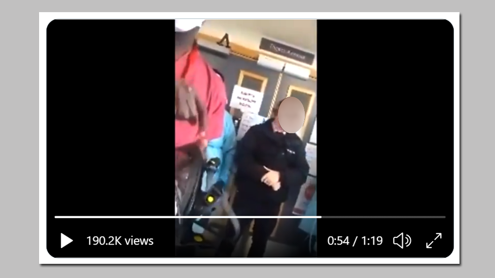 The man with the camera refuses to leave, and his way is blocked by hospital staff