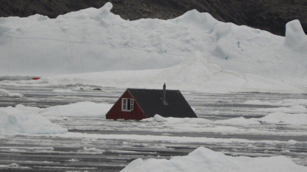 The surge of water is also reported to have swept away 11 homes in the village of Nuugaatsiaq, Geenland
