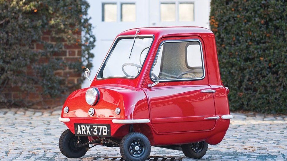 Peel P50 micro car sells for 'record' £120,000 at auction - BBC News