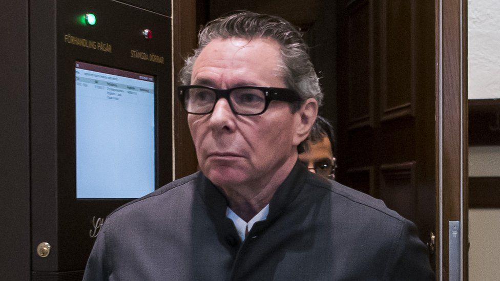 Frenchman Jean-Claude Arnault leaves the district court in Stockholm, 24 September 2018