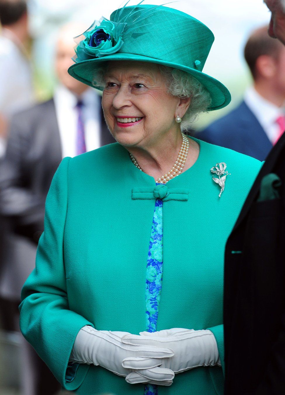 Queen Elizabeth II smiles during her trip to Bowness on Windermere, Cumbria on 17 July, 2013