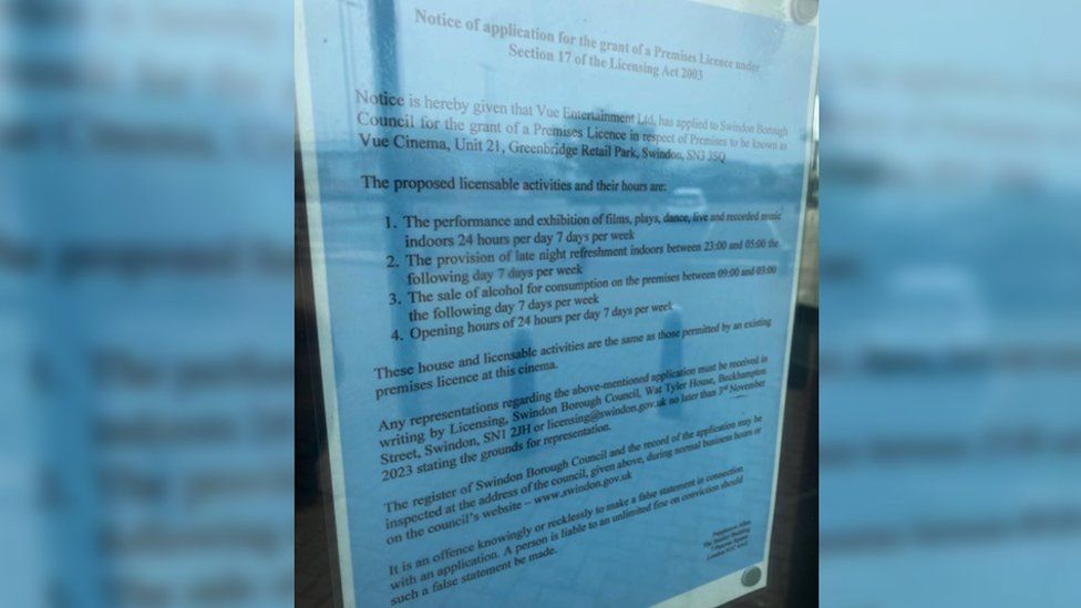 A blue letter saying that Vue Entertainment Ltd has applied for a Premises Licence from Swindon Borough Council. It is hung up in the window of the former Empire cinema in Swindon.