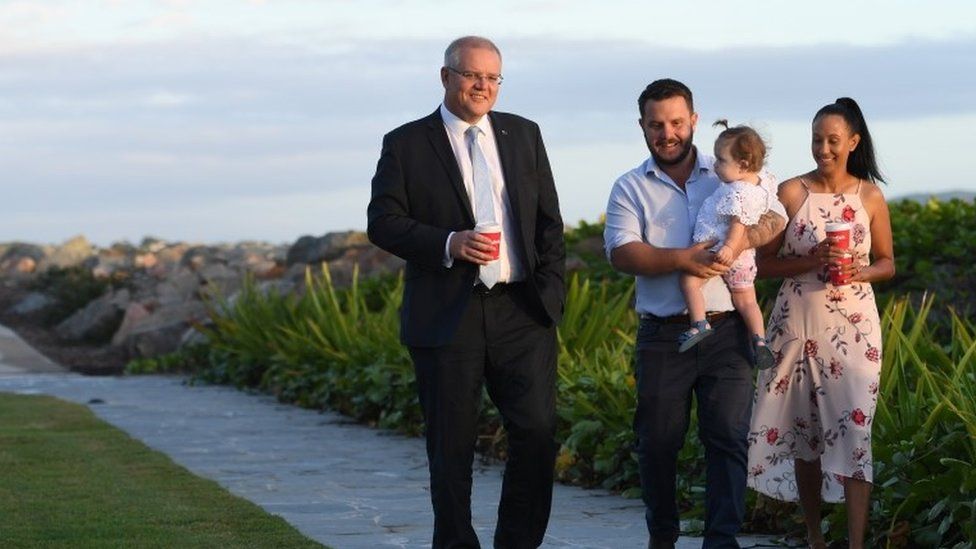 Australian PM Scott Morrison with Liberal candidate for Herbert Phillip Thompson (C), his wife Jenna Thompson and daughter (17 May 2019)