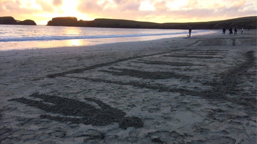 Soldier artwork on St Ninian's beach, Shetland