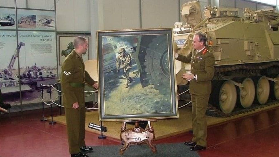 A painting that depicted Adam Miller during the ambush in Iraq