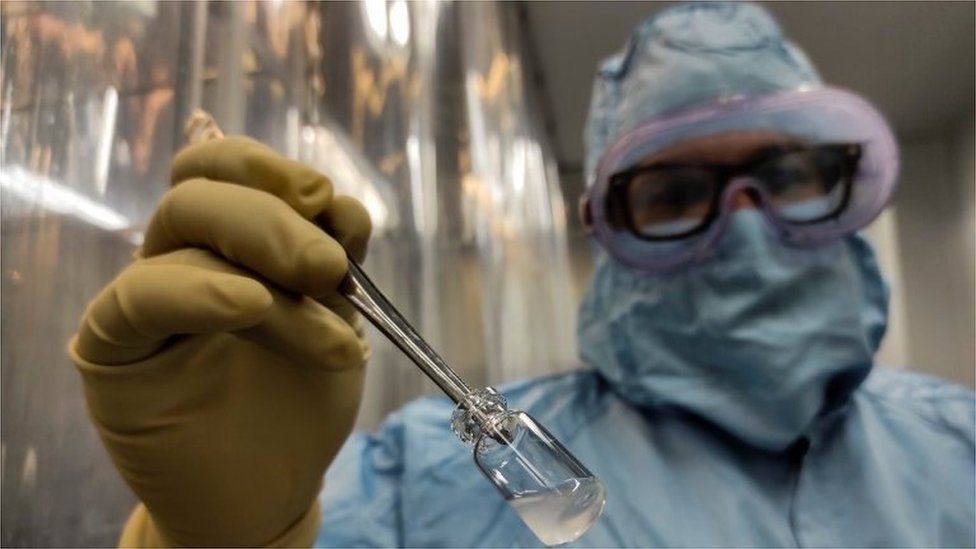 Yoel Hernandez shows a dose of Soberana 2 vaccine against Covid-19 in a laboratory of the Finlay Institute in Havana, Cuba, 20 January 2021.