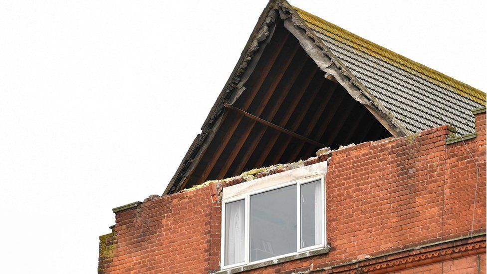Exposed roof timbers are pictured after a part of building collapsed in Herne Bay, Kent