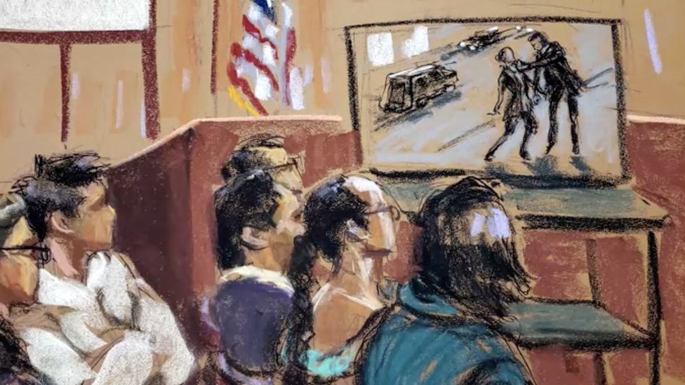 Court sketch of jurors watching CCTV footage of the assault.