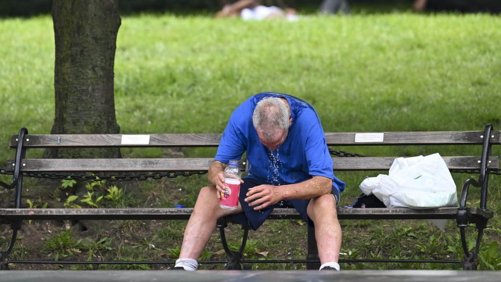 A man tries to cool off in the heat in New York