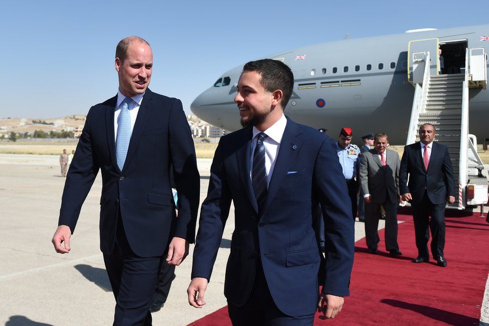Prince William is welcomed by Jordan's Crown Prince Hussein bin Abdullah II