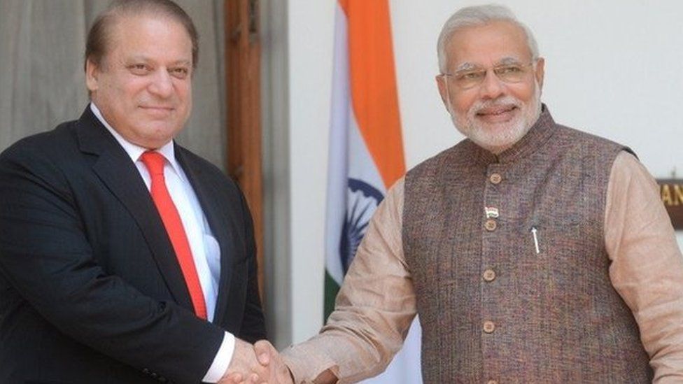 India's newly sworn-in Prime Minister Narendra Modi (R) shakes hands with Pakistani Prime Minister Nawaz Sharif during a meeting in New Delhi on May 27, 2014.