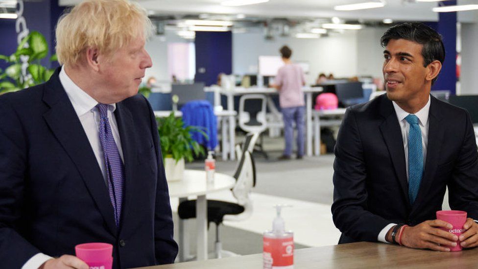 Boris Johnson and with Rishi Sunak