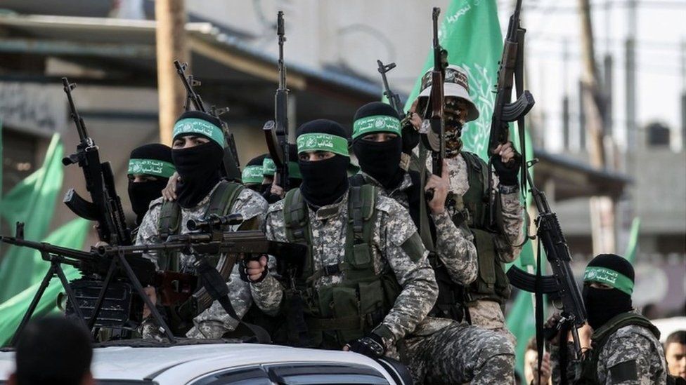 Members of the Ezzedine al-Qassam Brigades, the military wing of the Palestinian Islamist movement Hamas, take part in a rally marking the 29th anniversary of the creation of the movement on December 16, 2016.