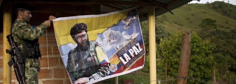 Jan. 3, 2016 file photo, Orlando, a rebel fighter for the 36th Front of the Revolutionary Armed Forces of Colombia or FARC