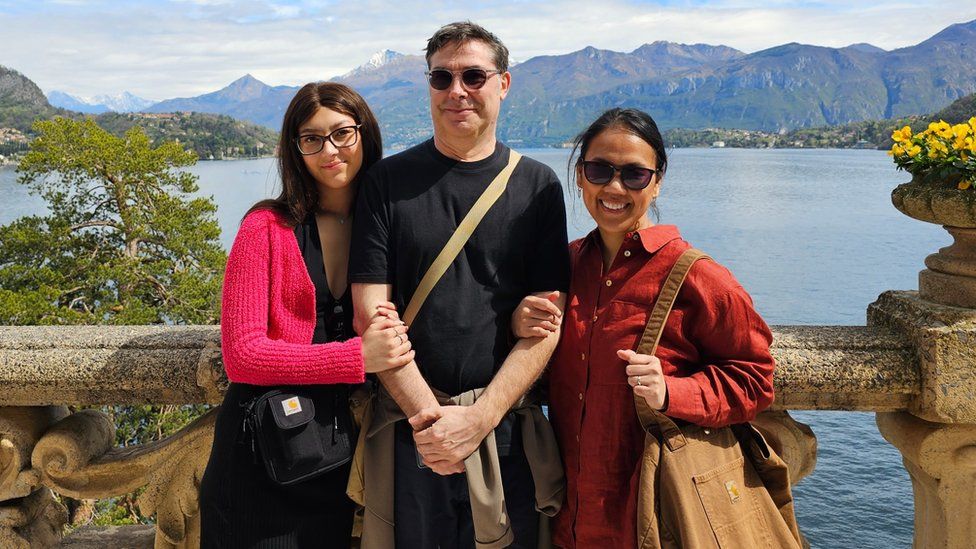 Maggie with her parents