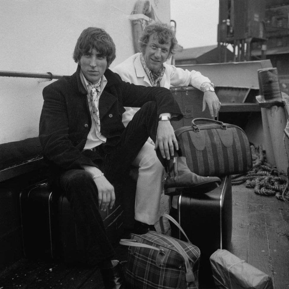 Disc jockeys Johnnie Walker (left) and Robbie Dale, of ship-based pirate radio station Radio Caroline South, at Felixstowe after the British government outlawed the station under the Marine Broadcasting Offences Act, 14 August 1967.