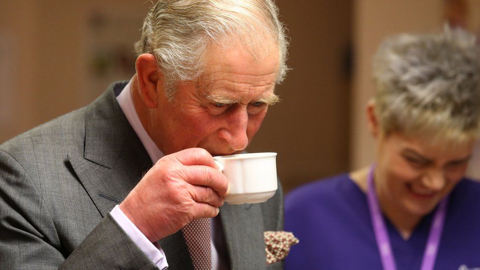 Prince Charles drinking tea