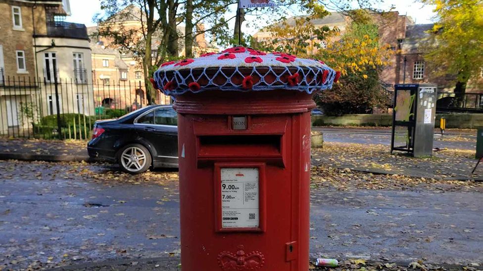 Poppy topper on York post box