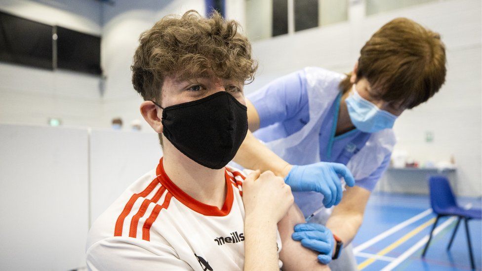 Eoin McCullagh being vaccinated