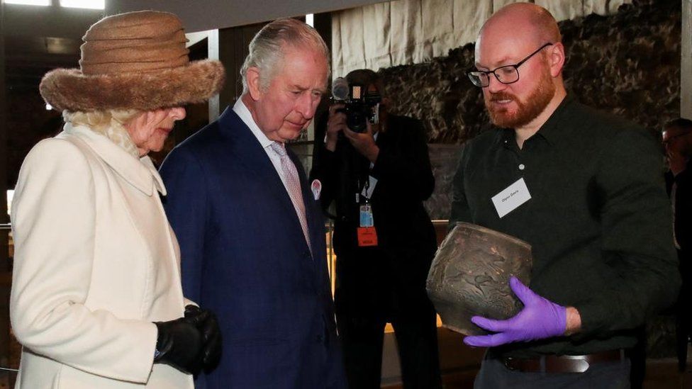 King Charles and Queen Consort Camilla are shown a vase at Colchester Castle