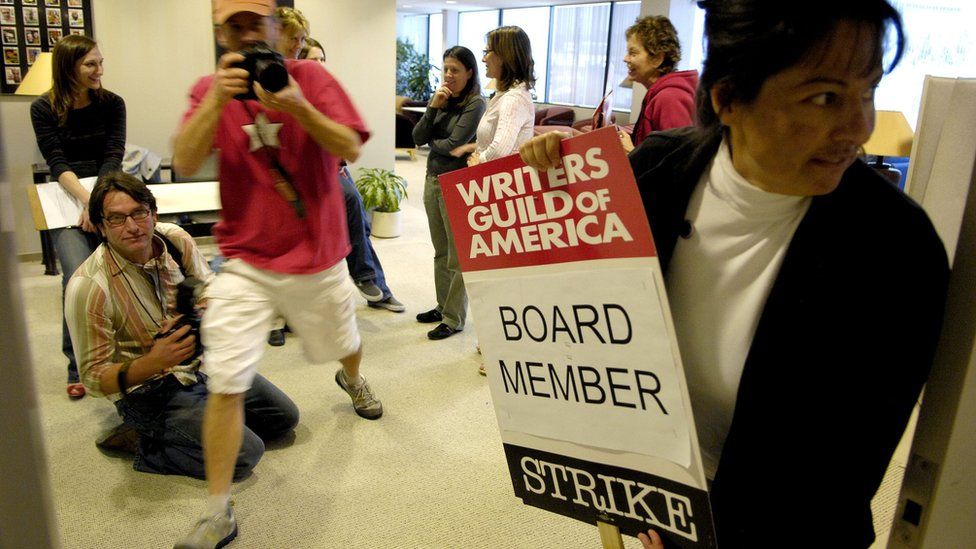 WGA member holds strike poster in 2008