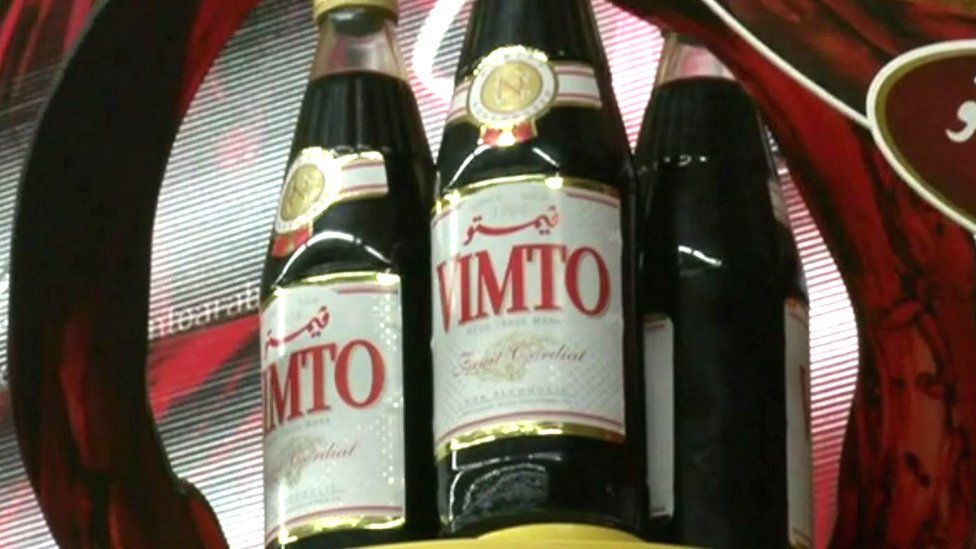 Large glass bottle used at Vimto
