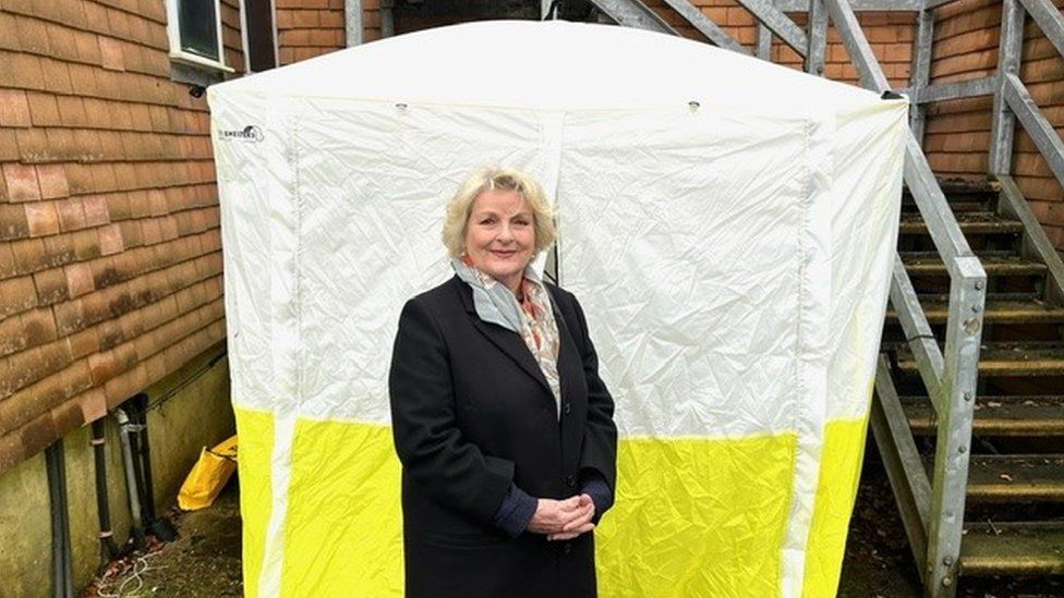 Brenda Blethyn standing outside a forensics tent