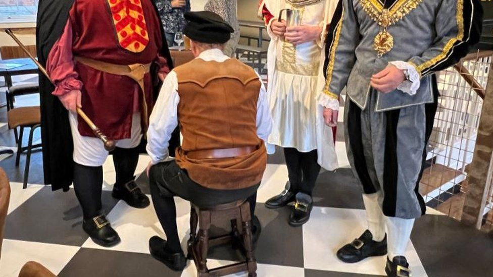 Gloucester sheriff tests ale in quirky medieval tradition BBC News
