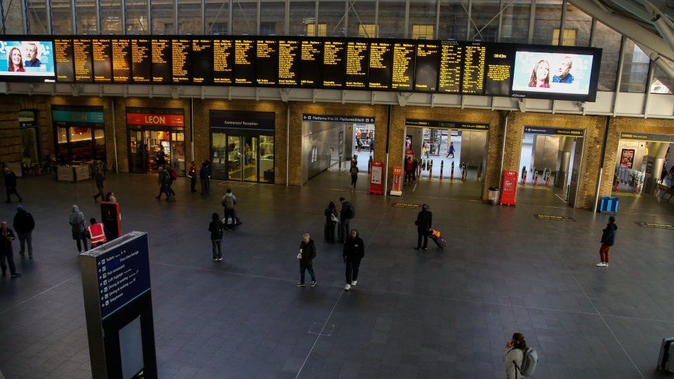 Passengers at an empty King's Cross railway station in central London on the third of the three days rail strike action